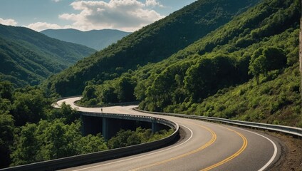 a long curved road going through the mountains