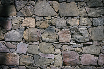 Stone wall texture background - grey stone with different sized stones 1