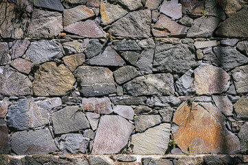 Stone wall texture background - grey stone with different sized stones 2