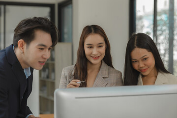 a group of businesspeople is brainstorming in the modern office, working together as a teamwork to share an idea, they are talking about what strategy that they will use for project