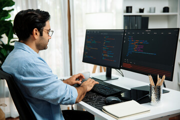 Smart IT developer working software development coding with creating application program update...