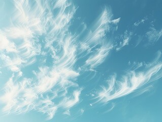 Wispy Cirrus Clouds Streaking Across a Brilliant Blue Sky, Illustrated to Emphasize the Delicate Textures of Atmospheric Phenomena