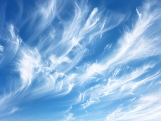 Wispy Cirrus Clouds Streaking Across a Brilliant Blue Sky, Illustrated to Emphasize the Delicate Textures of Atmospheric Phenomena
