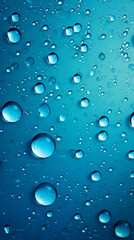 Close-up of water drops on blue background