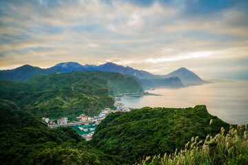 the atmosphere of the little city in the  mountain at sunset