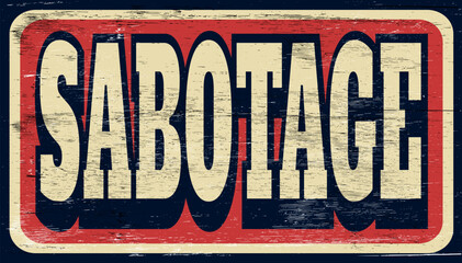 Aged and worn sabotage sign on wood
