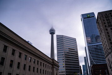 Fototapeta premium View of the CN Tower from Toronto Downtown. Toronto, Canada - April 29, 2024.