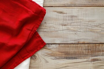 top view with red empty kitchen napkin isolated on table background. Folded cloth for mockup with copy space, Flat lay. Minimal style - generative ai