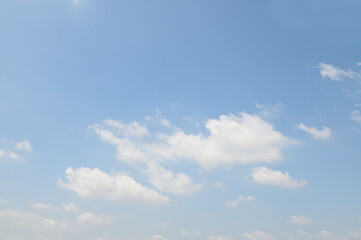 Bright Blue sky with white cloud. Beautiful sky background and wallpaper. Clear day and good...