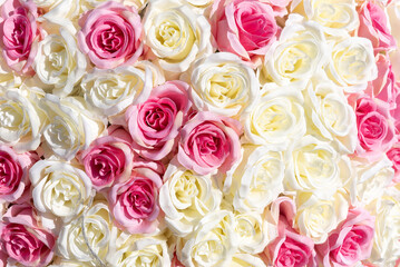 Background full of realistic fabric Roses, Fabric roses texture background