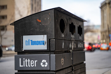 Fototapeta premium City of Toronto's litter and recycling bins. Toronto, Canada - April 29, 2024.