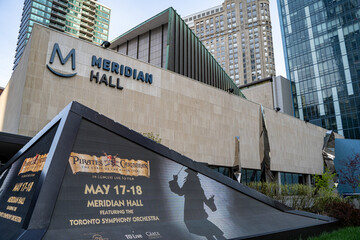 Naklejka premium Meridian Hall sign. Meridian Hall is a performing arts venue in Toronto, Ontario, and it is the country's largest soft-seat theatre. Toronto, Canada - April 29, 2024.