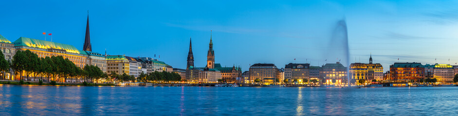 Hamburg Germany, night panorama city skyline at Alster Lake with Fountain