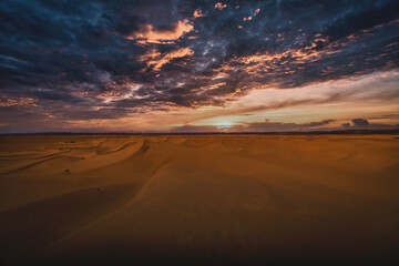 A dusk of panoramic sand dune at Mhamid el Ghizlane in Morocco wide shot