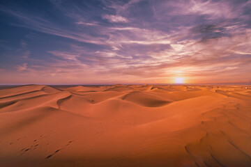 A dusk of panoramic sand dune at Mhamid el Ghizlane in Morocco wide shot