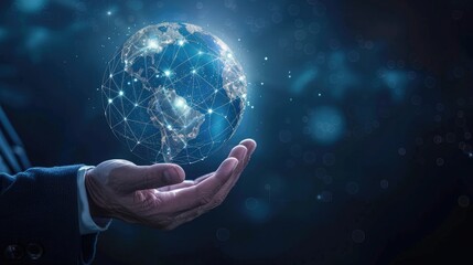 A businessman's hand displays a holographic globe against a dark blue backdrop, symbolizing global connectivity and digital transformation