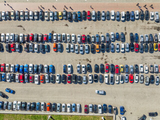 Open air big parking for residents of the area, top aerial view from high.