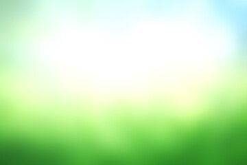 Obraz premium Blur imanges of green grass,sky blurred bokeh background, Natural outdoors background. bright tone.