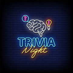 trivia night neon Sign on brick wall background 