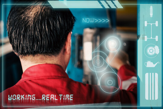 Car mechanic inspects car using technology and computer show resault at virtual screen.