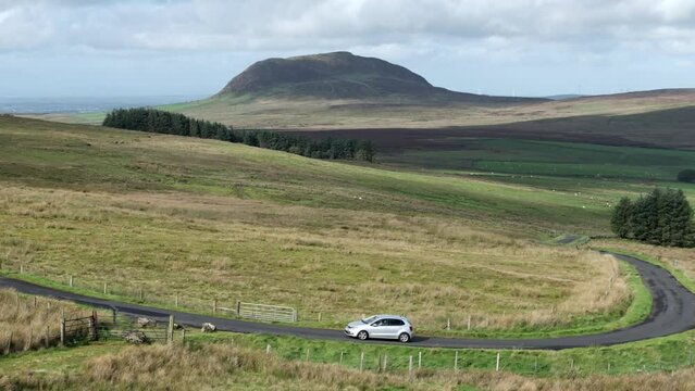 Slemish Mountain in County Antrim Northern Ireland. Aerial 50fps UHD