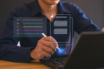 Businessman checks business performance Businessman using laptop doing online checklist survey Fill out the digital form checklist, take the assessment, online questionnaire.