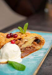 strudel with apple, ice cream and coffee