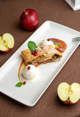 strudel with apple and ice cream in a restaurant
