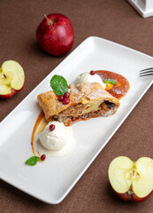 strudel with apple and ice cream in a restaurant
