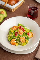 green salad with shrimp and chili pepper