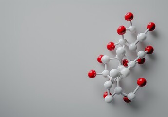 Molecular structure on grey backdrop with space for text. 