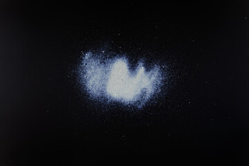 abstract white dust on a black background.
