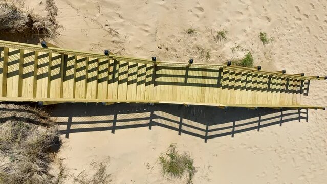 Gimbal style parallax spin across the stairs to the shore.