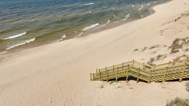 Tilting to the shoreline of Lake Michigan.