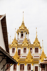 Fototapeta premium golden spires on buddhist temple in Bangkok Thailand