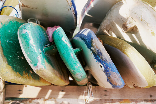 Old and Worn Kitesurfing Boards on a Beach in Bali, Indonesia