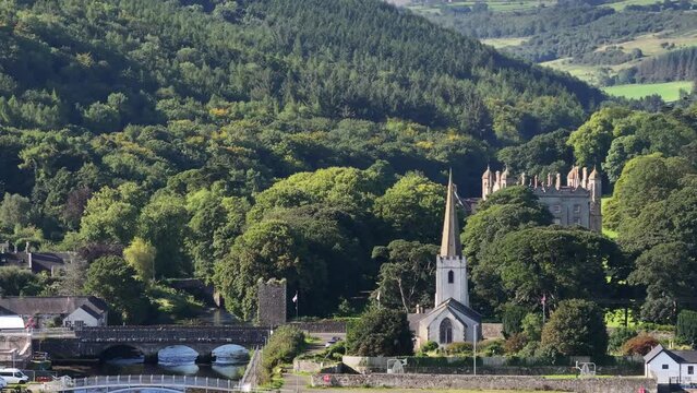 Glenarm on The Antrim Coast Road in Northern Ireland. Part of the Causeway Coastal Route. Aerial 50fps UHD