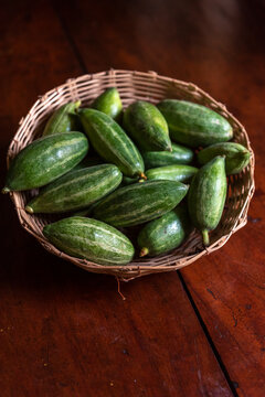 Pointed gourd or potol, an Indian vegetable in a basket.