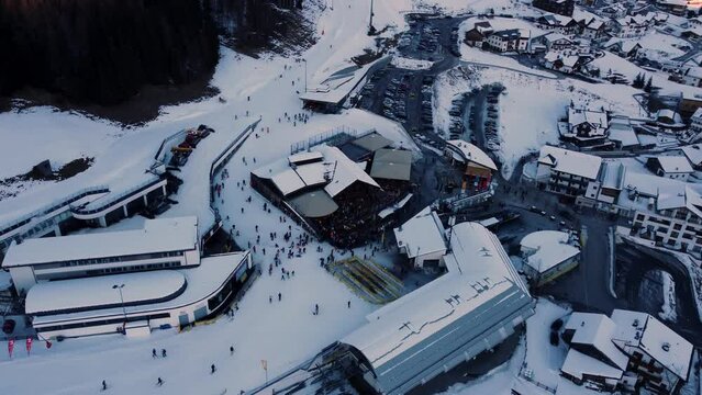 Aerial above ski resort town Fiss in Austrian alps during winter