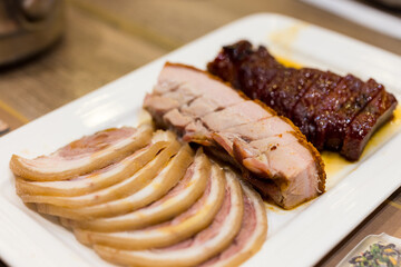 Barbecue pork belly and roasted pork in Cantonese cuisine restaurant