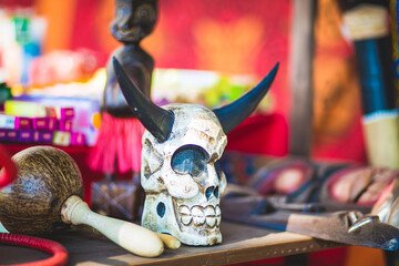 Halloween table setting skull in a black bowl