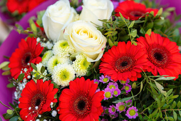 bouquet of red gerberas and white roses in spring