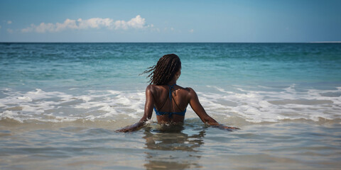 Beautiful black girl ocean beach, summer time, vacation, copy space.