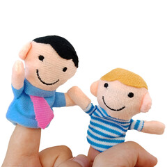 Finger theater isolated on a white background. Two fingers wearing puppets; father and son. Kid...