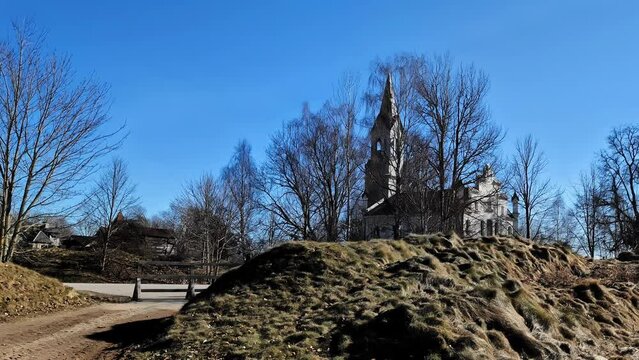 Cinevilla Studio garden walkaround, medieval church backyard, sunny day in Latvia