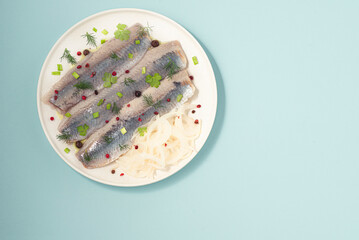Spicy salted herring with pepper served with pickled onions. An important fish, the first...