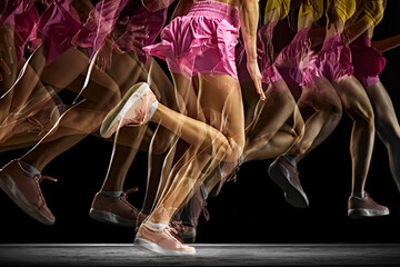 Power and athleticism. Cropped image of athletic, muscular female legs in motion, running against...