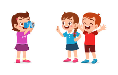little kid holding camera and take photo of friend