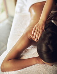 Woman, back massage and wellness in spa for relax, recovery and peace on vacation or weekend. Body care, treatment and holistic healing in beauty salon with professional masseuse, zen and detox