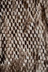 Abstract background of brown wrapping paper. Texture of wrapping paper with holes.